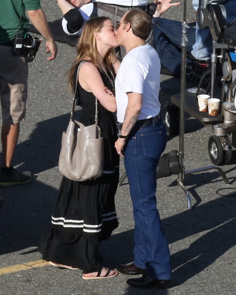 Johnny Depp and Amber Heard packed on the PDA on his Black Mass set in Boston on Monday.
