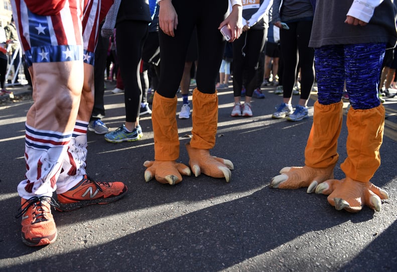 Runners wear turkey costumes at Turkey Trot in Denver, Colorado