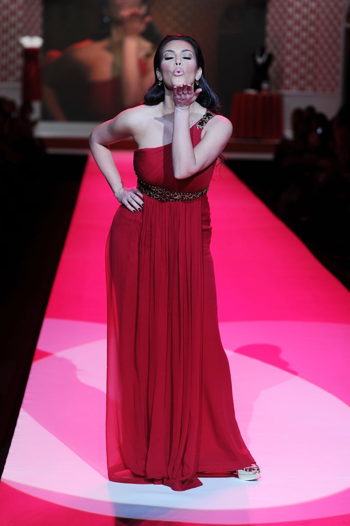 She blew a kiss to showgoers as she walked the runway for Heart Truth's Red Dress Collection show during New York Fashion Week in February 2010.