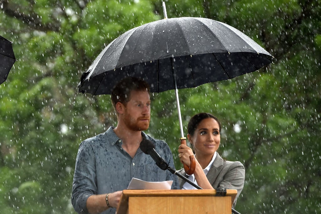 Meghan Markle Holding Prince Harry's Umbrella October 2018