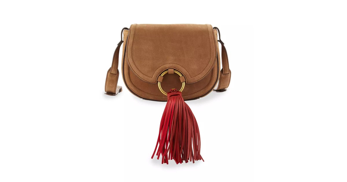 Tory Burch Tassel Mini Leather Saddle Bag ($475) | Metal Ring Bags