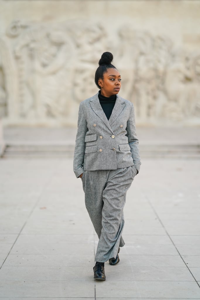 If your pantsuit is the star of the show, layer underneath to fight the chill with a thick turtleneck.