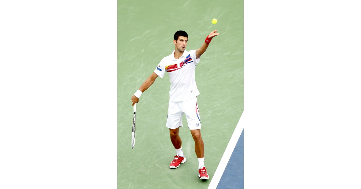 Novak Djokovic Paired Red Tennis Shoes With A Cool Striped Shorts And