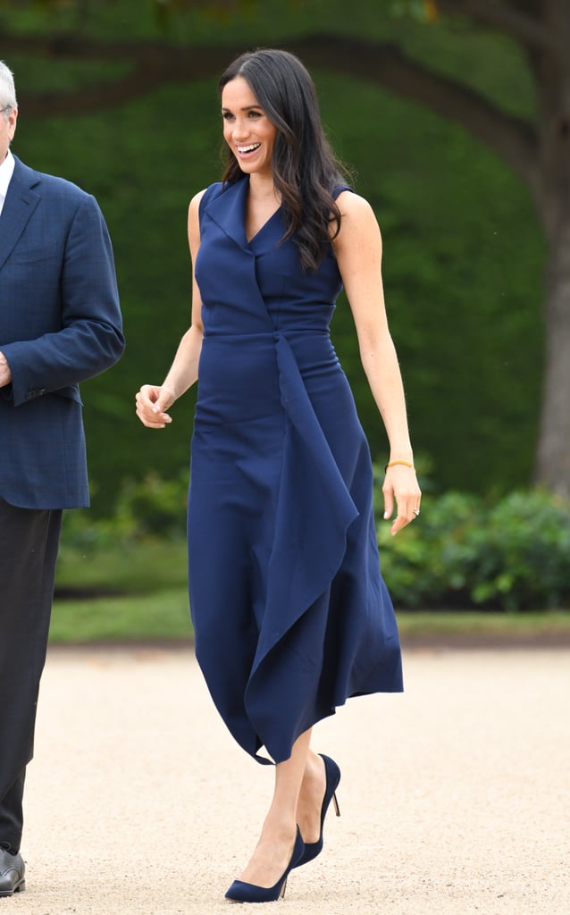 Meghan in a Navy Sleeveless Dress | Meghan Markle Wearing Blue During ...