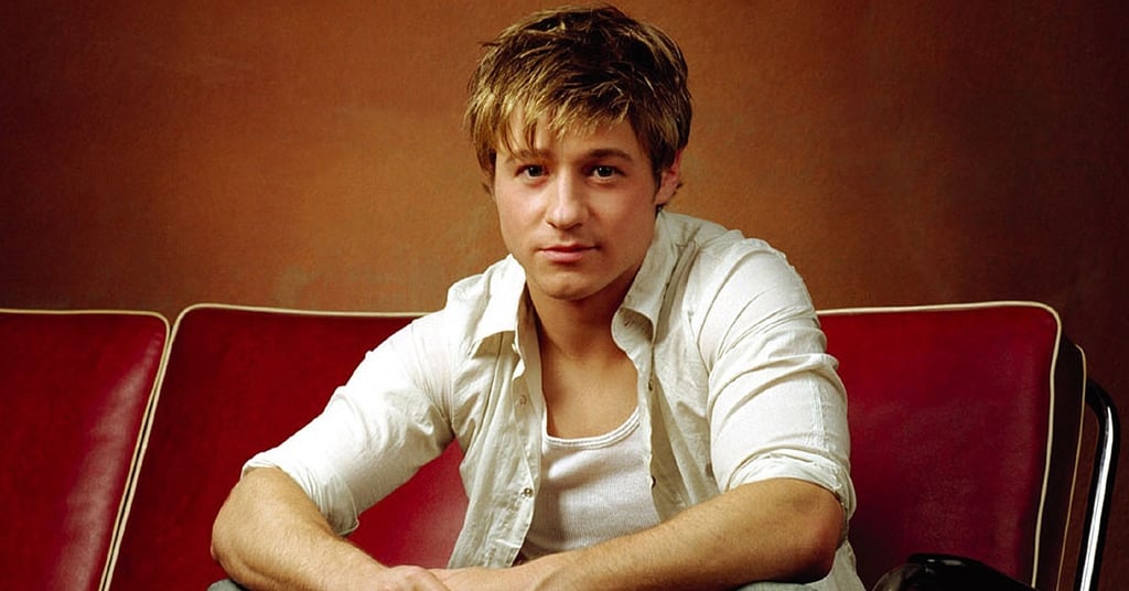 Sometimes, he wore an open button-down with a tank underneath.