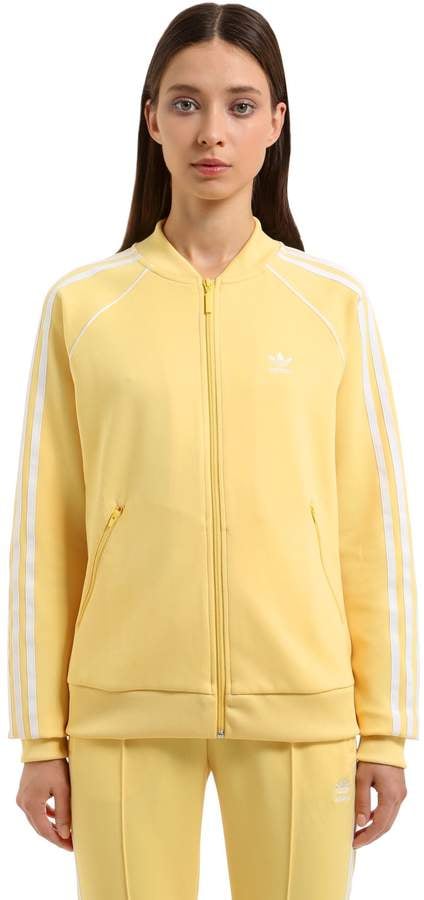 adidas sst windbreaker yellow