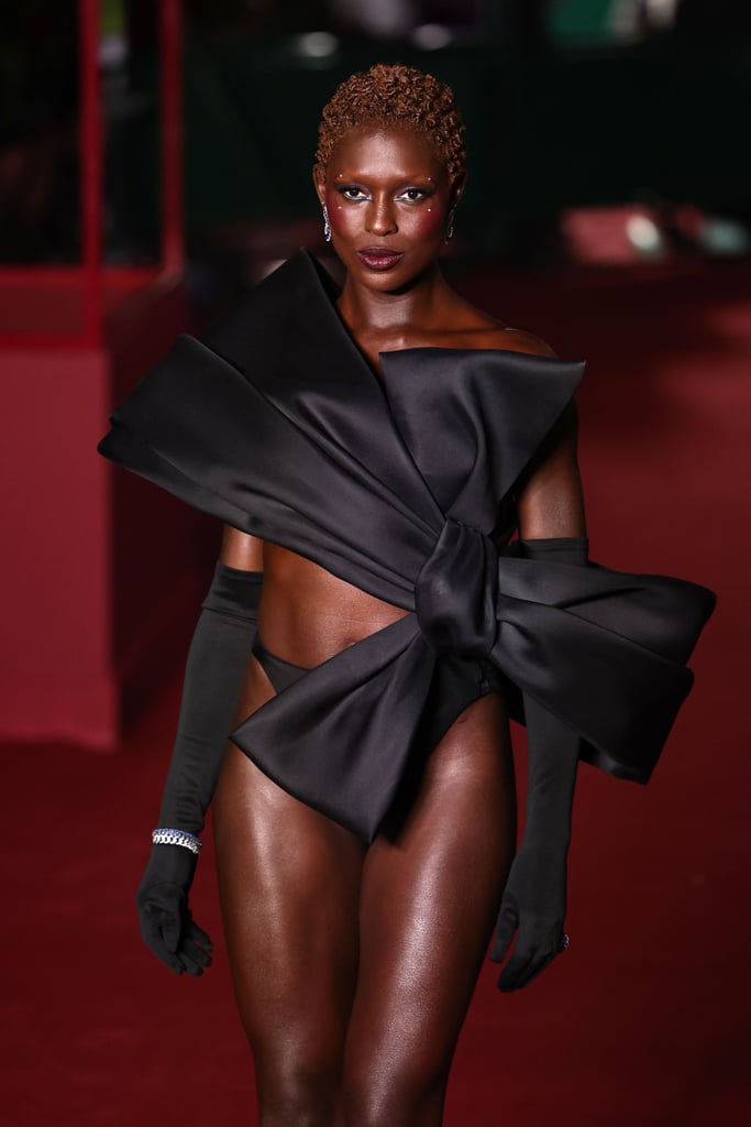 Jodie Turner-Smith Wears Giant Bow and Thong to Vogue World]