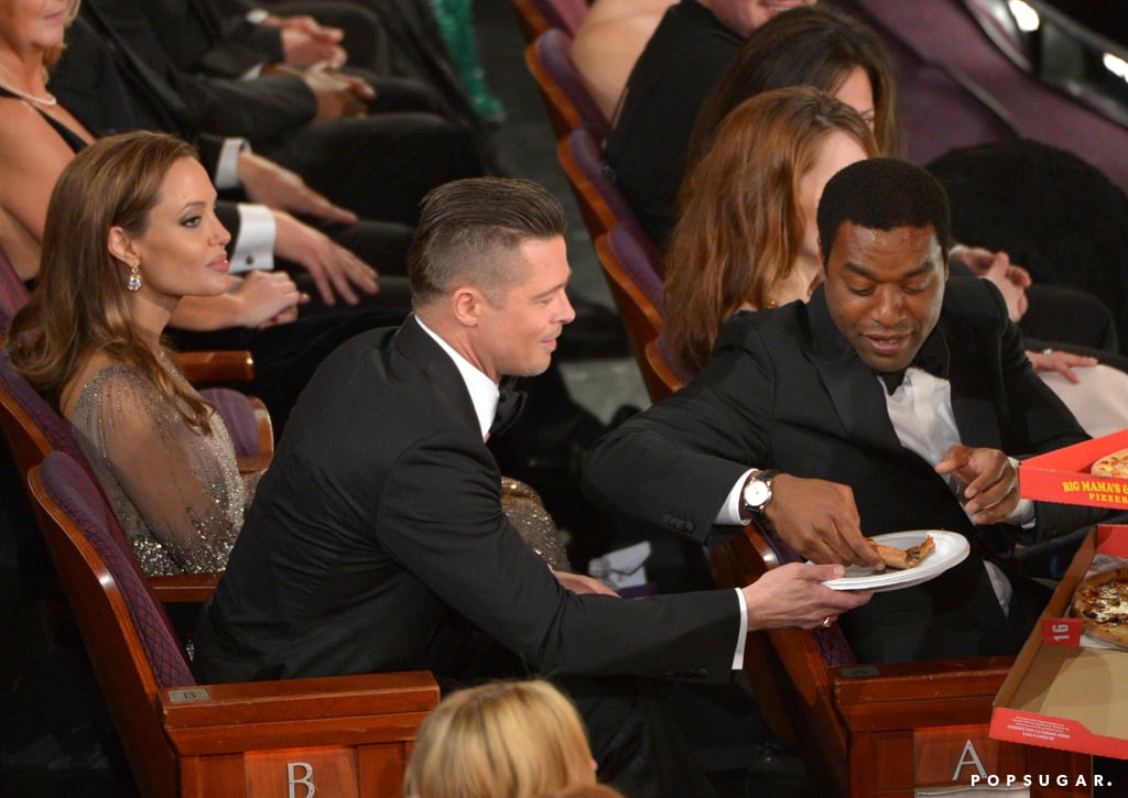 Brad Pitt got a pizza from Chiwetel Ejiofor.