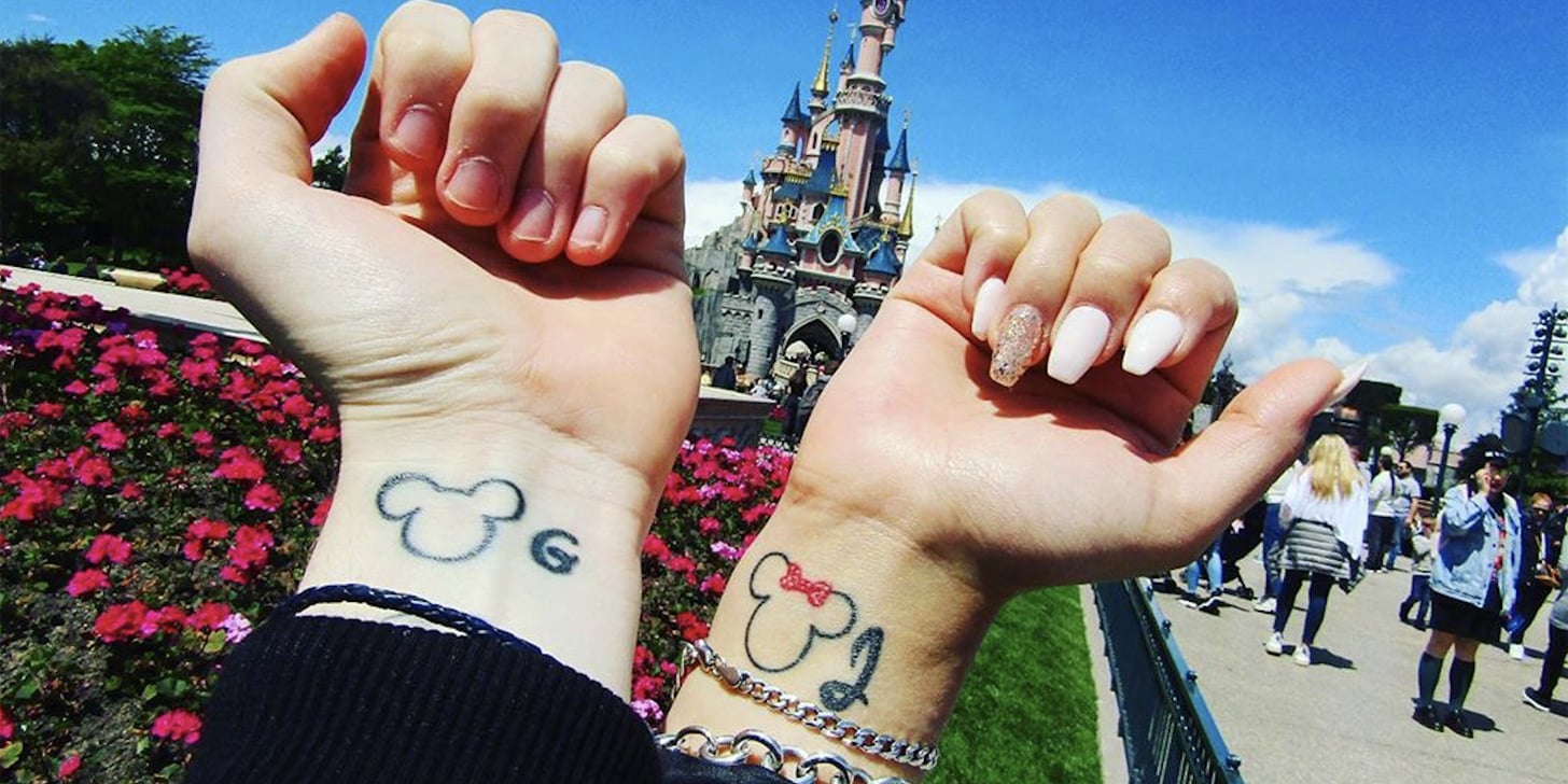 mickey mouse heart hands tattoo