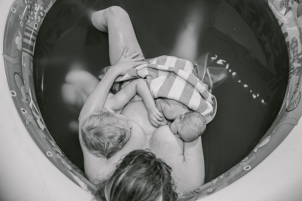 Mom Breastfeeding During Childbirth