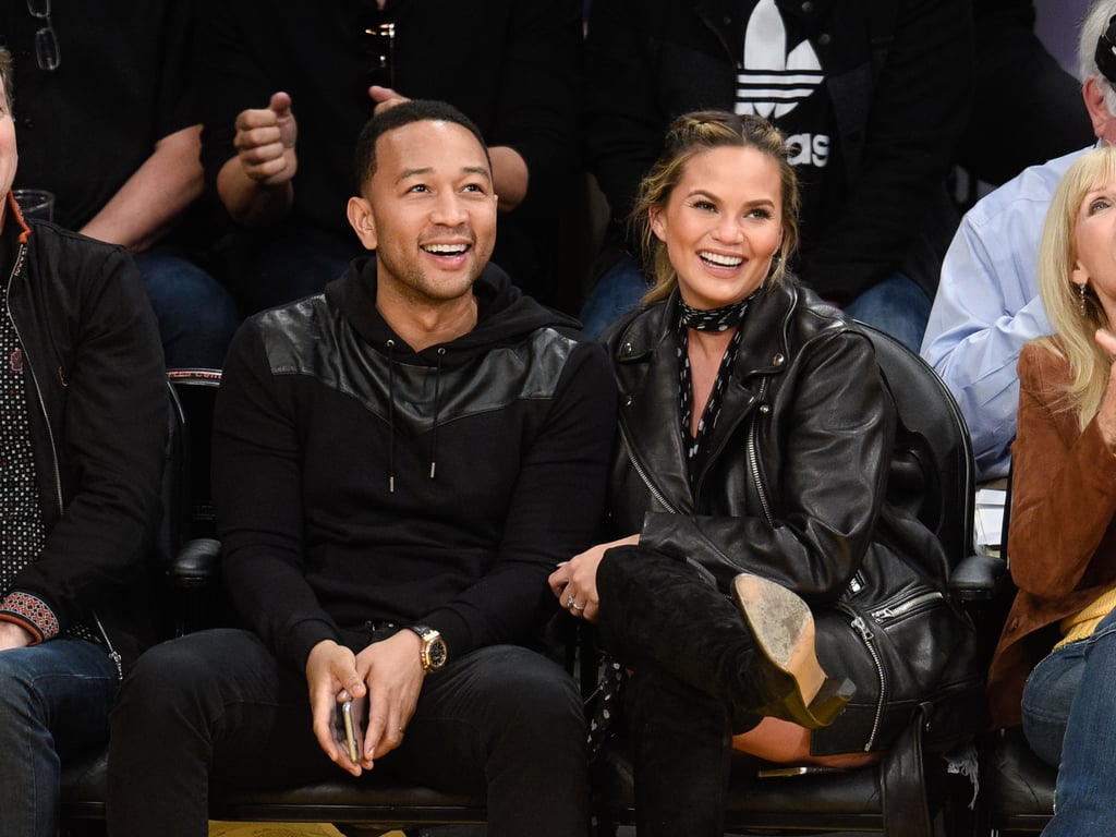 To attend a March basketball game in Los Angeles, Chrissy paired over-the-knee boots with a leather jacket.