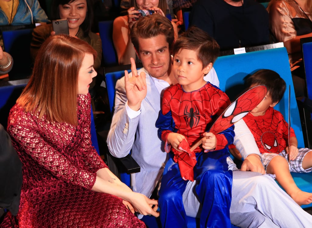 They posed with a pint-sized Spider-Man at a March 2014 fan event in Singapore.