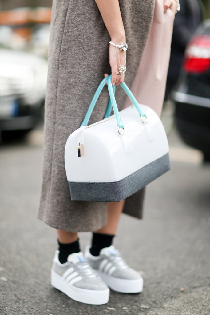 We love the no-fuss feel of this bag and these cool kicks.