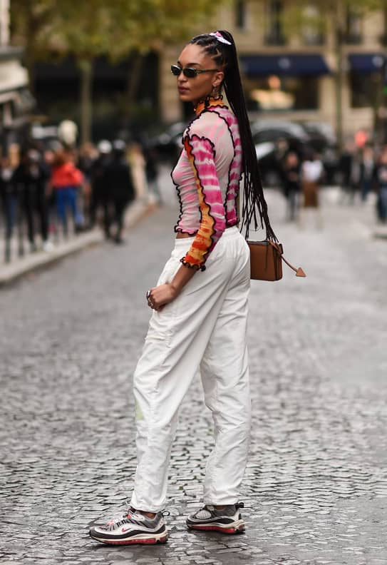 986 Track Pants Street Style Stock Photos, High-Res Pictures, and