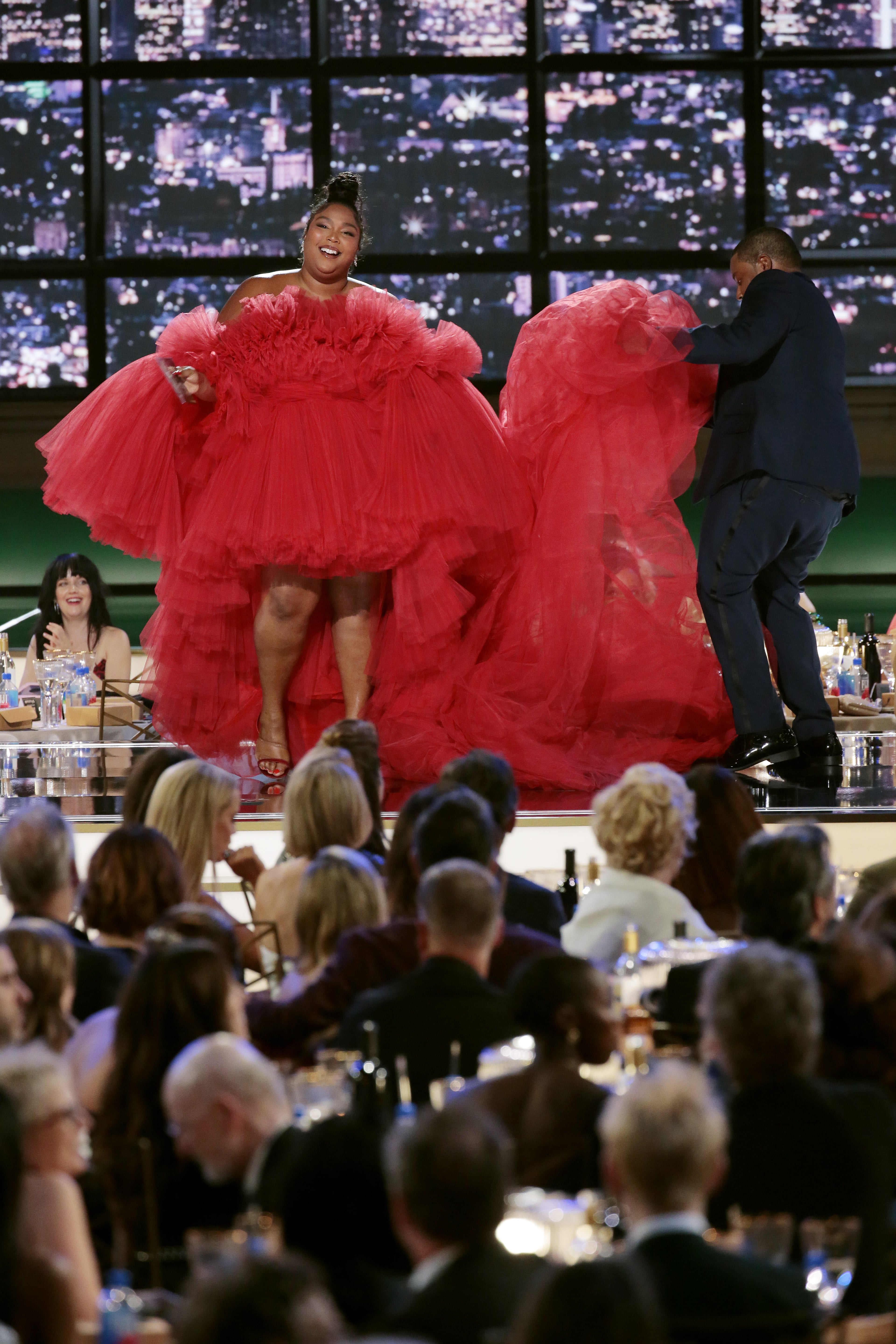 lizzo red dress Grammys 2023: Lizzo Rocks a Red Rose Caped Gown on the Red Carpet