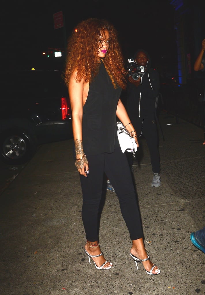 Looking Sleek in a Black Jumpsuit and Sandals