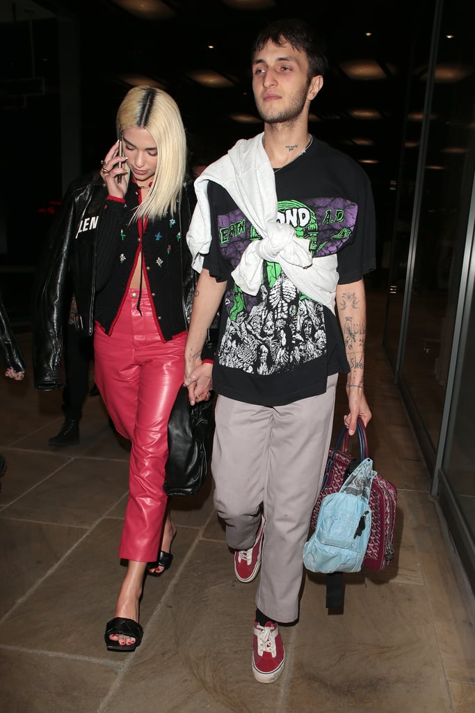 We love that Anwar subtly matched Dua's red hot leather look with his canvas sneakers.
