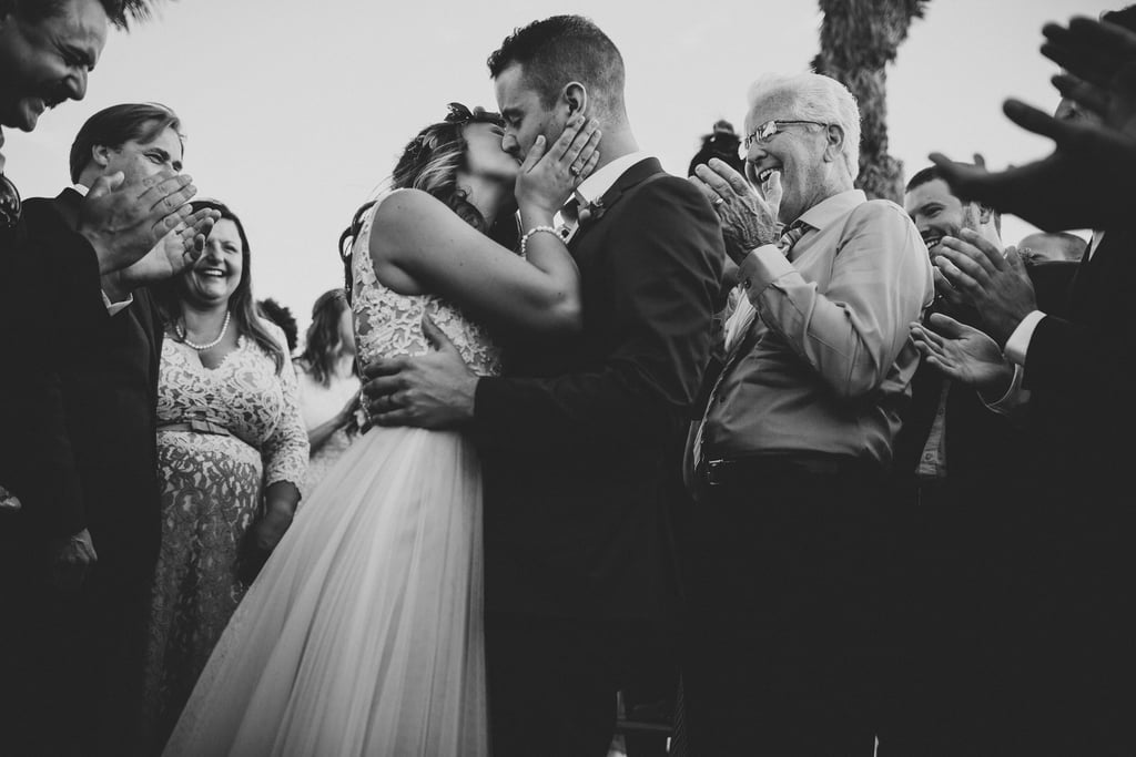 "This capture is our personal favorite of the year because it was truly the first time we witnessed the joining of two lives surrounded by and consumed by their loving family and friends. It was not about being up on a stage for everyone to observe, it was about a commitment between two souls and two families, together. Photos can only capture so much, but when we look at this photo it seems to tell a story that is deeper than words." — Aubrey Westlund