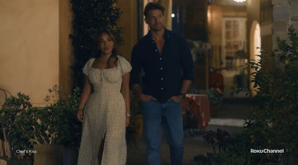 By evening, as the story softens into something more intimate, Lauren's seen in a light, flowy floral dress that moves easily with her through the village streets. The silhouette is relaxed, the styling is minimal, and its effect is undeniably romantic. It's not a dramatic finale look — it's a believable one, reinforcing that her character's appeal lies in ease, not excess. 
Shop the look: Dmoyala Floral Corset Maxi Dress ($26)