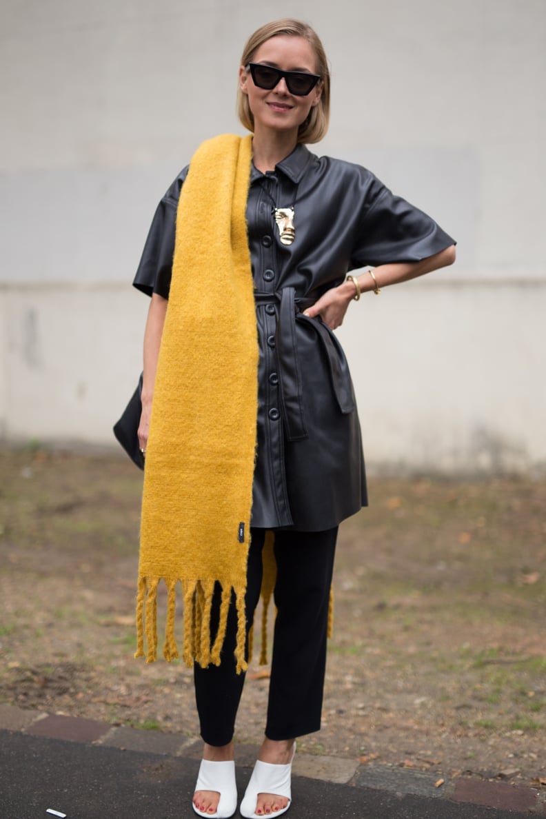 Throw a Bright Marigold Scarf Over an All-Black Outfit to Really Pop