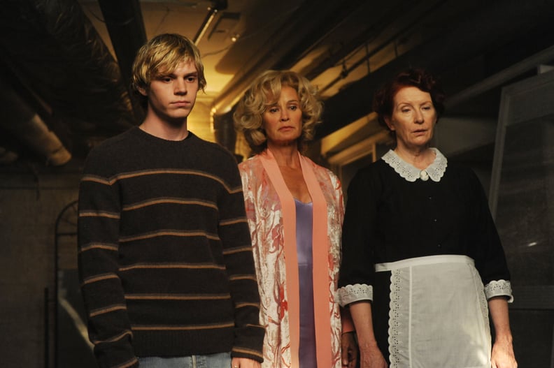 AMERICAN HORROR STORY: MURDER HOUSE, (from left): Evan Peters, Jessica Lange, Frances Conroy, 'Home Invasion', (Season 1, ep. 102, aired Oct. 12, 2011), 2011-. photo: Ray Mickshaw /  FX Network / Courtesy: Everett Collection