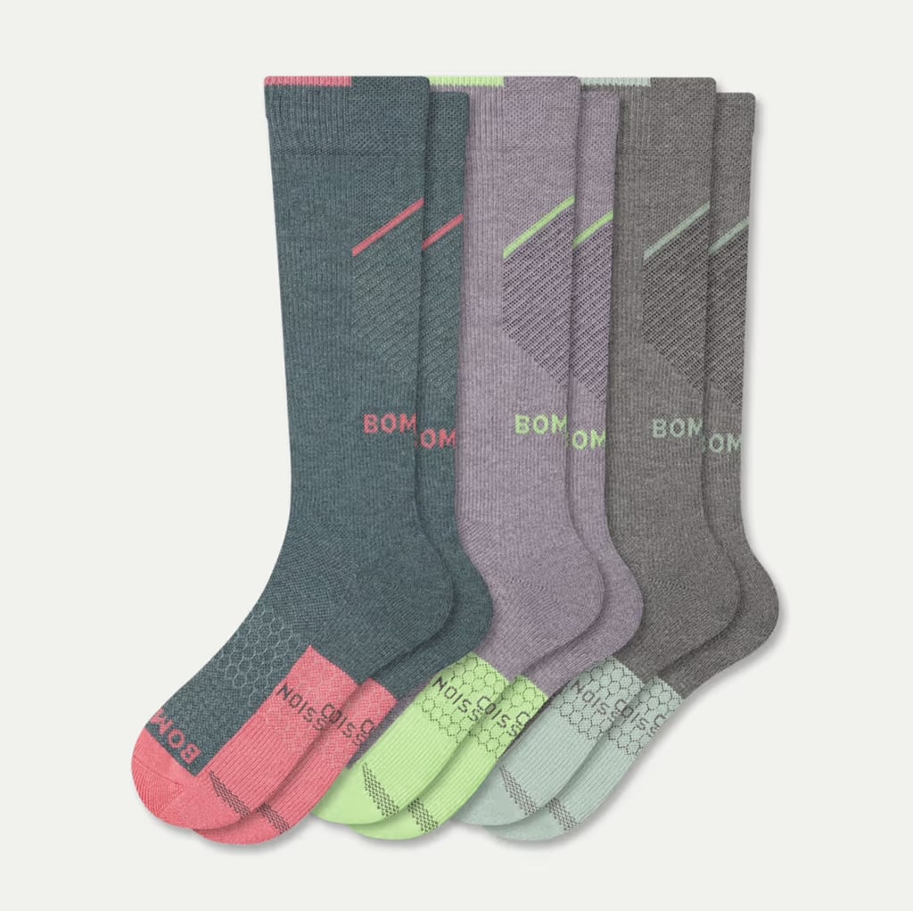 Bombas Performance Compression Sock 3-Pack ($120)
I love that these compression socks climb all the way up to the knee and provide support with a maximum squeeze all day long post-run. I tend to slip them on after a long run, right before rolling out and stretching. At the end of the day, when I take them off, I feel as though I've just released my calves from a 12-hour massage. When my knee is bothering me, I opt for these longer socks, but I also depend on ZenToes Plantar Fasciitis Compression Socks ($16) to promote circulation in that area specifically when I feel my residual pain creeping back in. You can even layer! In my opinion, the more compression the better, as long as it isn't painful.