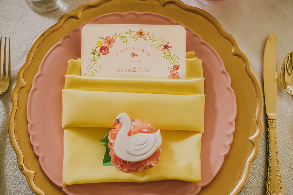 Each place setting had a custom-designed swan cookie from Frog Prince Cake and Cookie Design.