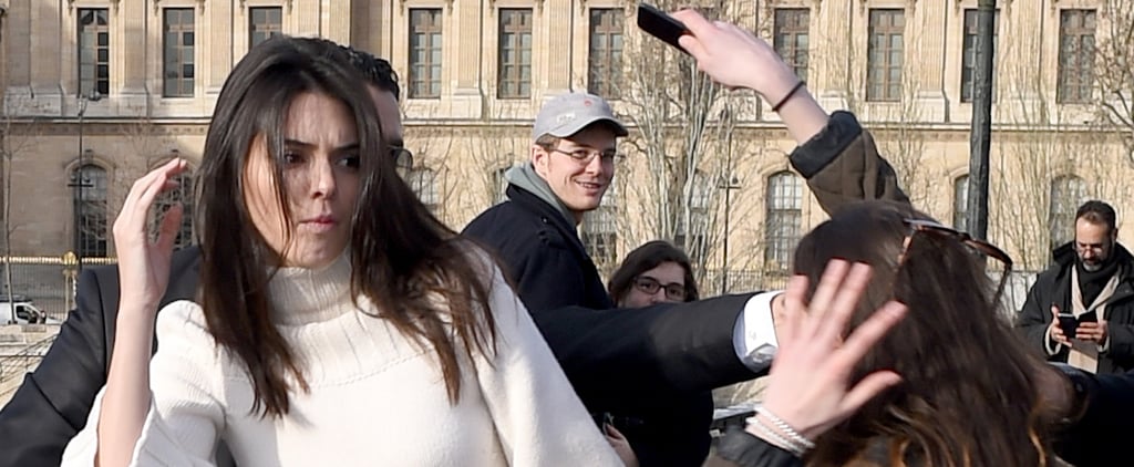 Fan Tries Kissing Kendall Jenner in Paris | Pictures