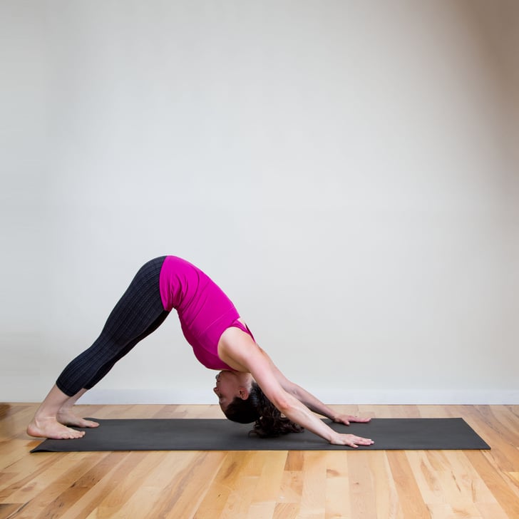 dog in yoga pose statue