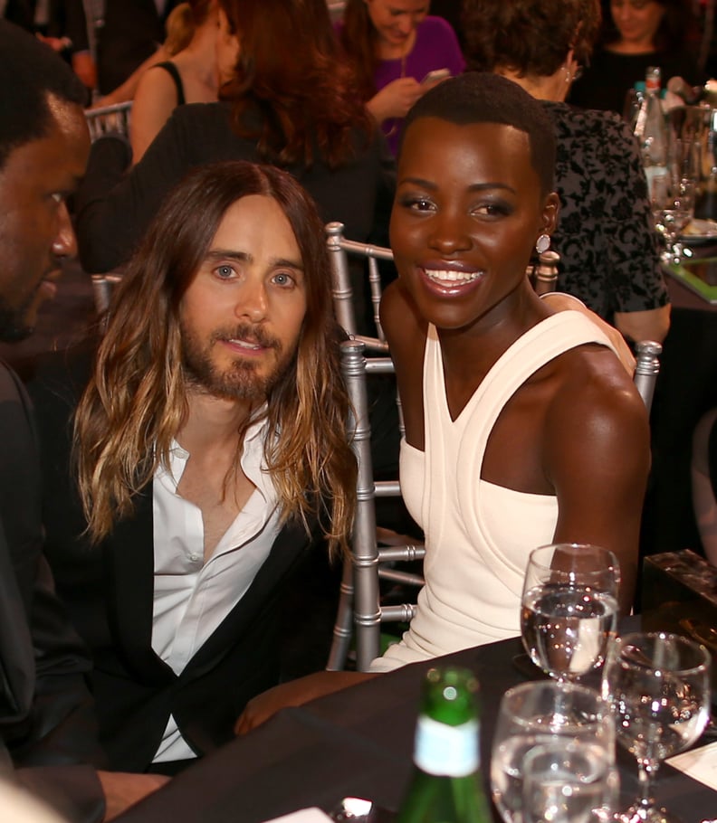 The night that started it all: Jared gets snapped kneeling beside Lupita during the Critics' Choice Awards in 2014.