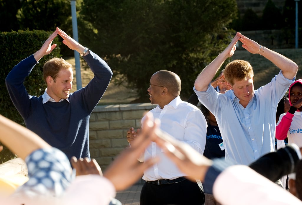 They danced with children affected by HIV during a visit to Lesotho in June 2010.