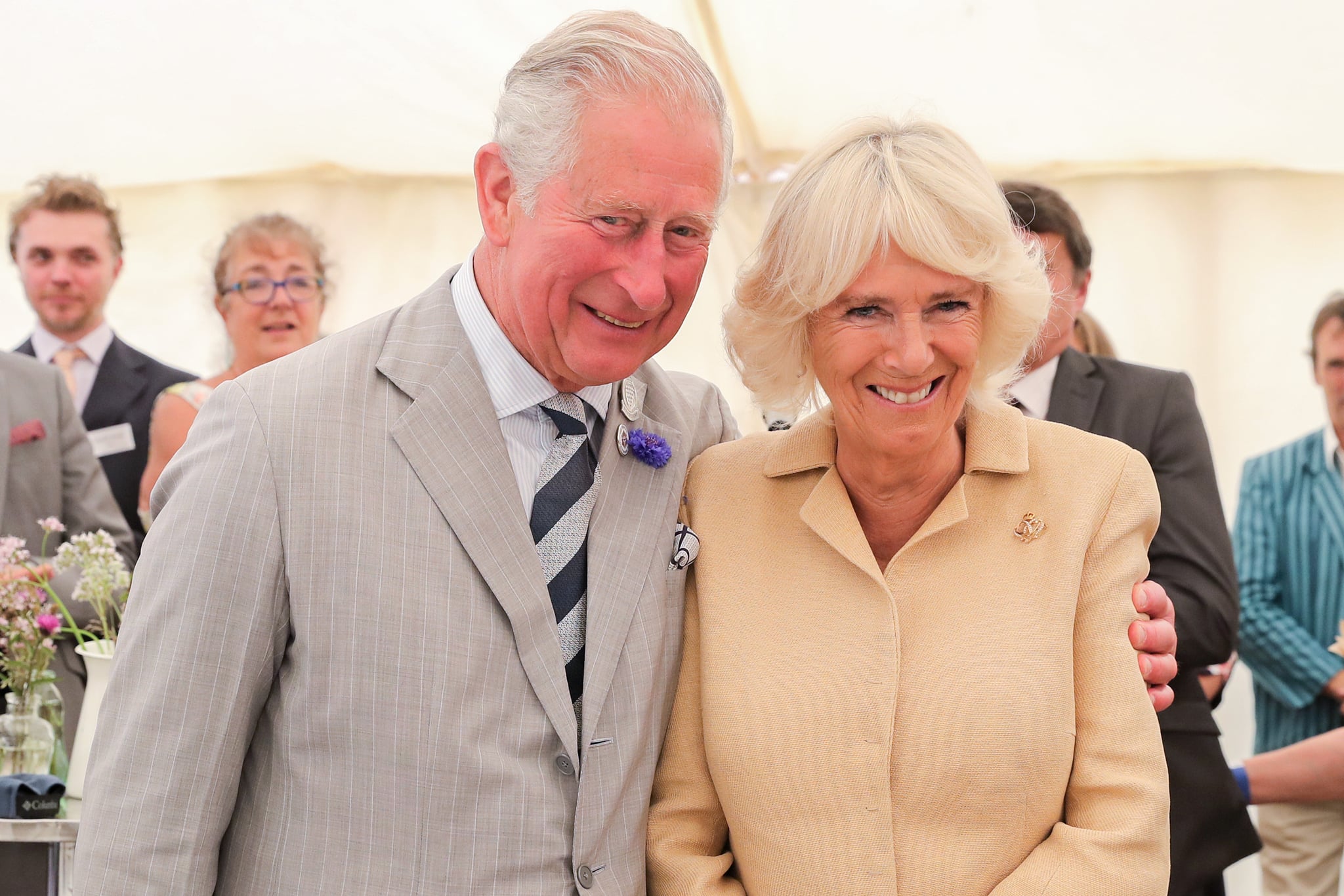 SIMONSBATH, ENGLAND - JULY 17: Camilla, Duchess of Cornwall is sung Happy Birthday by Prince Charles, Prince of Wales and the crowds gathered at the National Parks 'Big Picnic' celebration in honour of all 15 of the UK's National Parks, during an official visit to Devon & Cornwall on July 17, 2019 in Simonsbath, England. Held in Exmoor National Park the picnic marks 70 years since they were created by the 1949 National Parks and Access to the Countryside Act. (Photo by Chris Jackson/Getty Images)