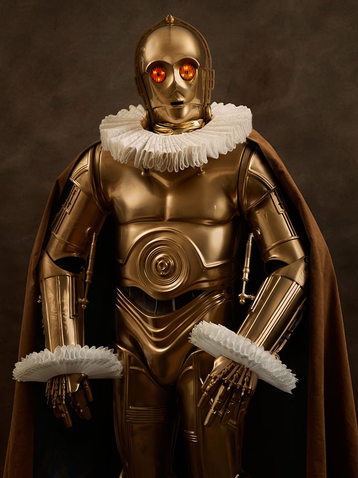 C-3PO: "Picture of a Man Wearing a Gold Armor"
