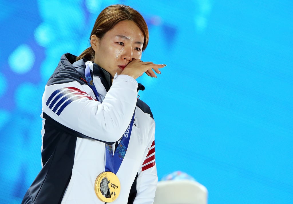 South Korea's Lee Sang-hwa wiped away tears after winning the gold in the women's speed skating 500-meter event.