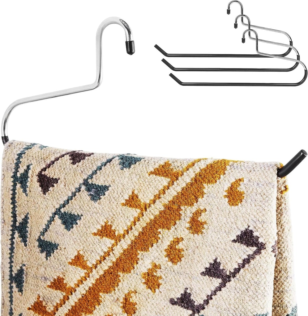 Stock Your Home Blanket Hangers ($20)
"These are my go-to options if you want to implement the 'blanket hanger method,'" Maegan Bucur says of these Stock Your Home Blanket Hangers. This set of six long stainless-steel hangers is perfect for heavier and chunkier blankets like quilts and comforters. You can hang and display all your most used or favorite throw blankets in your closet and easily access them when you want to cuddle up.
