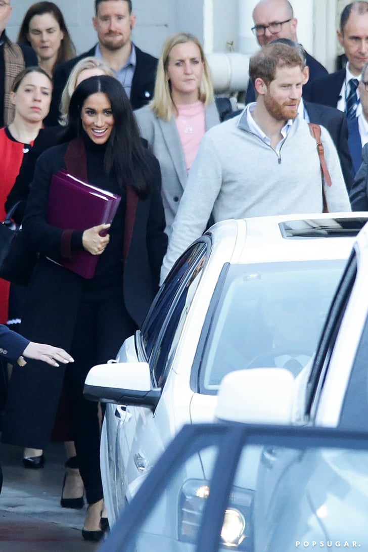 Meghan Markle's Black Coat With Maroon Trim October 2018