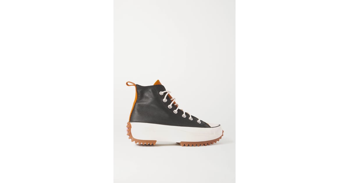 black run star hike high top sneakers