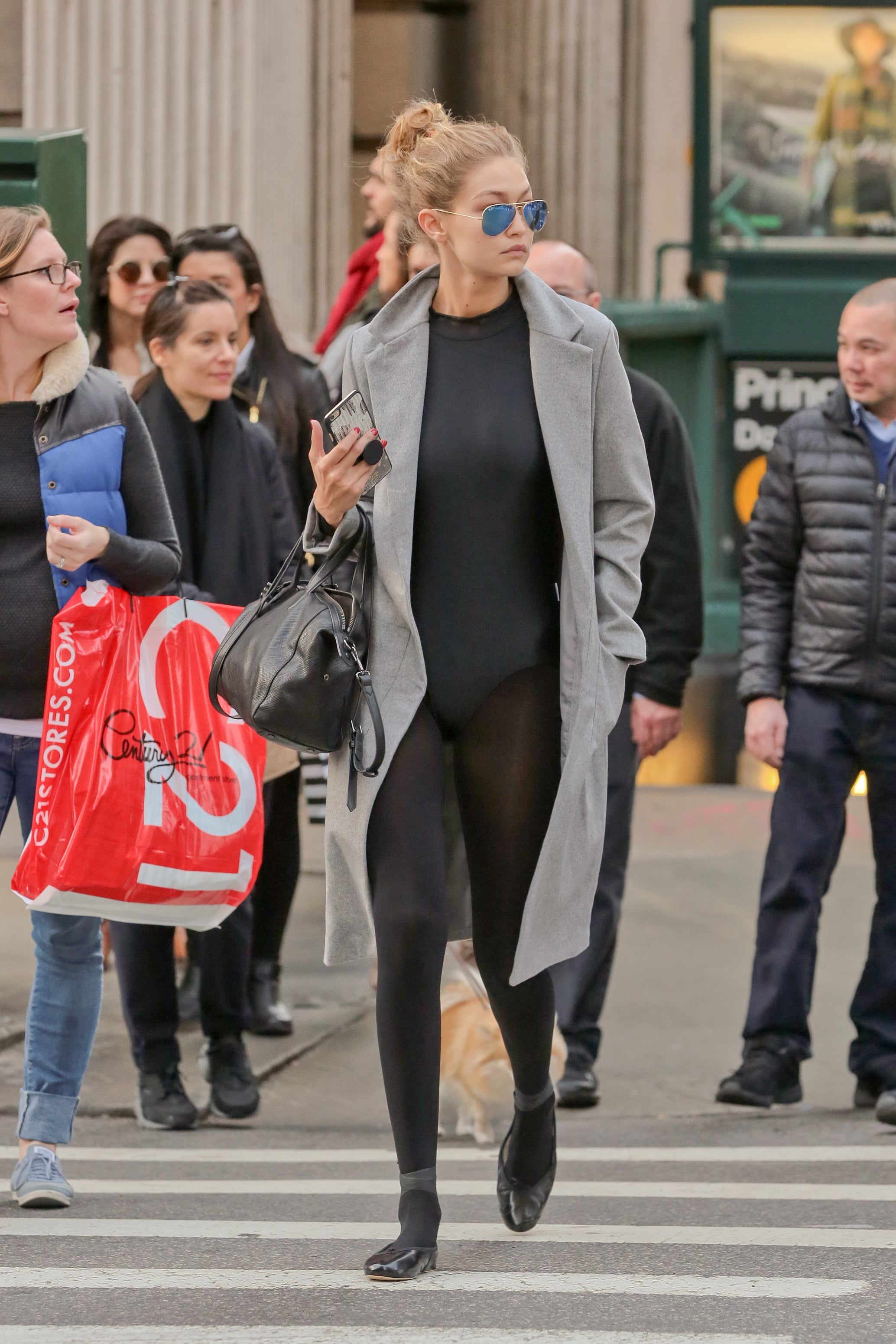 Gigi Hadid wearing Grey Coat, Black Crew-neck T-shirt, Black Leggings,  Black Leather Ballerina Shoes