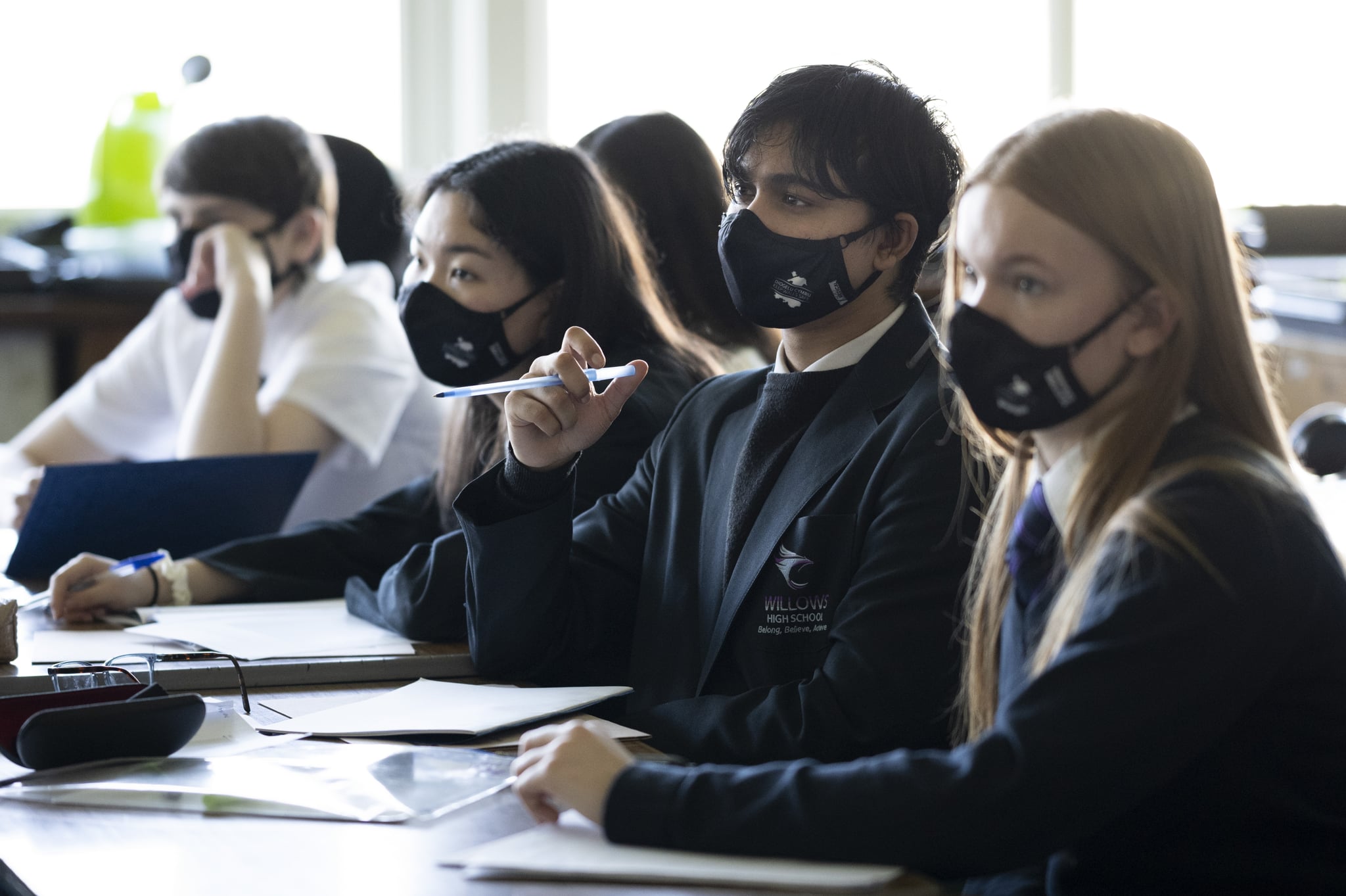 CARDIFF, WALES - MARCH 16: Schoolchildren look on during a lesson at Willows High School on March 16, 2021 in Cardiff, Wales. Secondary schools in Wales reopen this week having been closed to most pupils since the beginning of the year due to Covid-19 concerns. (Photo by Matthew Horwood/Getty Images)