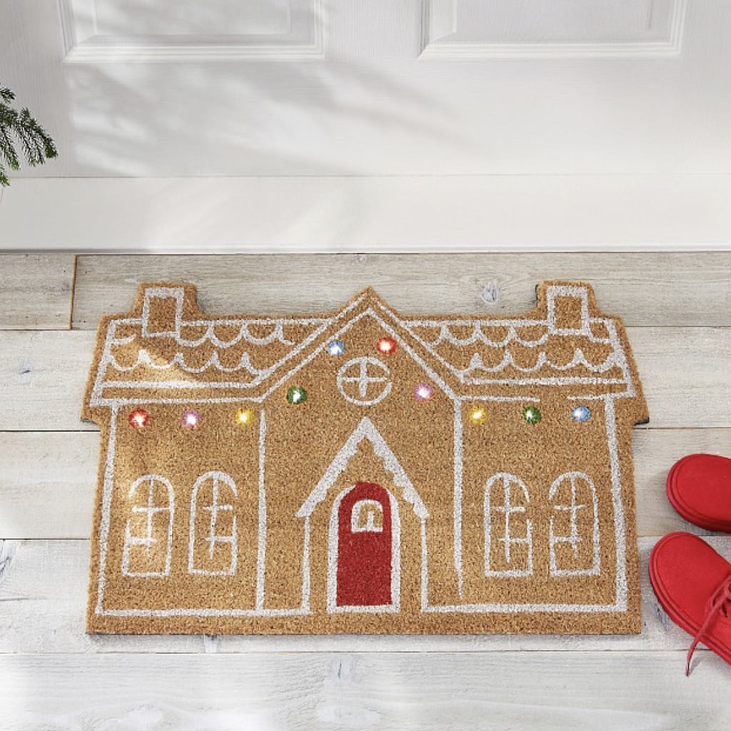 Pottery Barn's Gingerbread House Doormats Feature Actual Christmas Lights