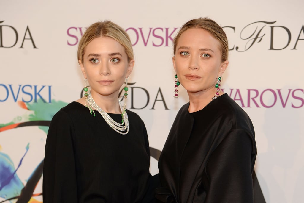 Ashley and Mary-Kate sported matching natural makeup and center-parted hairstyles at the 2014 CFDA Awards.