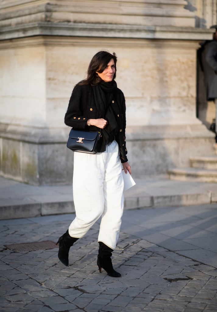 For French-girl chic, tuck a longer pair of wide-leg pants into your boots.