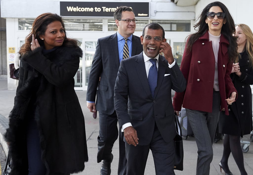 Amal Clooney Wearing a Red Coat