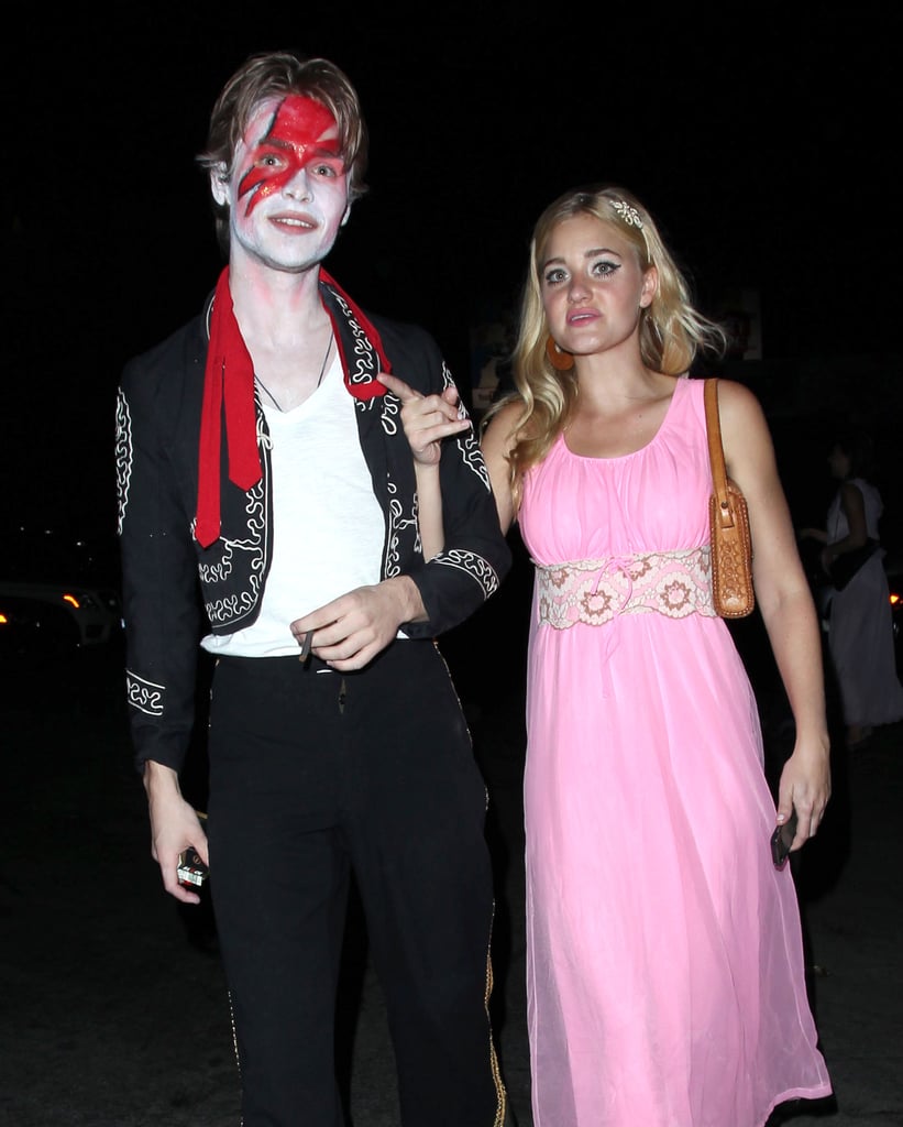 Actress and singer Aly Michalka went with a pink dress, while her date went all out with blood.