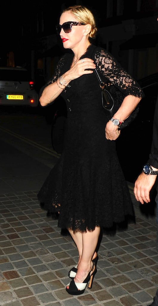 Madonna wore her sunglasses while out in London on Friday night.