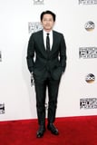 Steven Yeun Looks So Good at the AMAs, It Will Hurt Your Perfectly Intact Brain