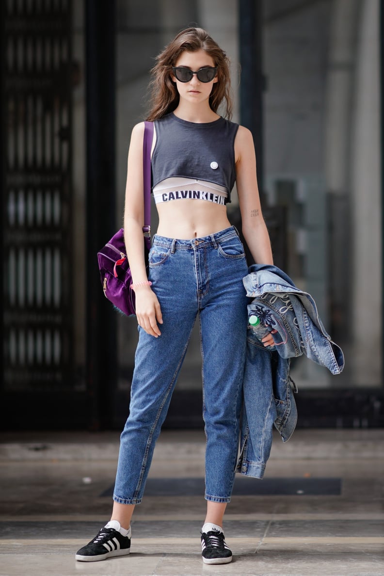 Style a Sports Bra With a Crop Top and High-Waisted Jeans