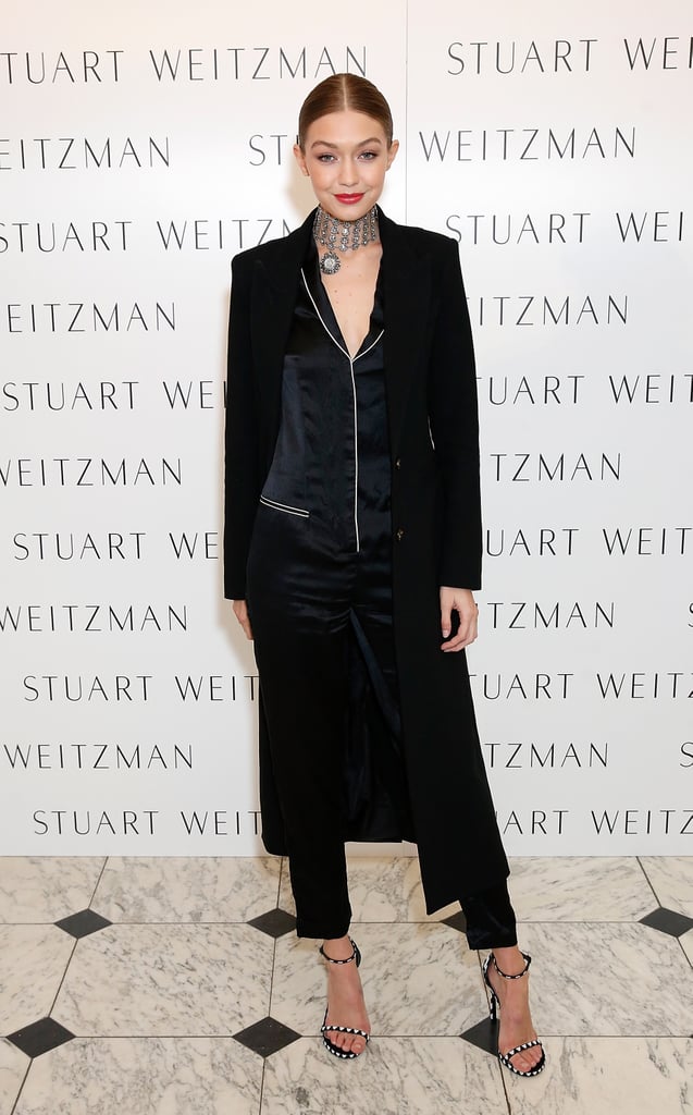 Gigi Paired Her Satin Jumpsuit With a Black Duster and Heeled Sandals