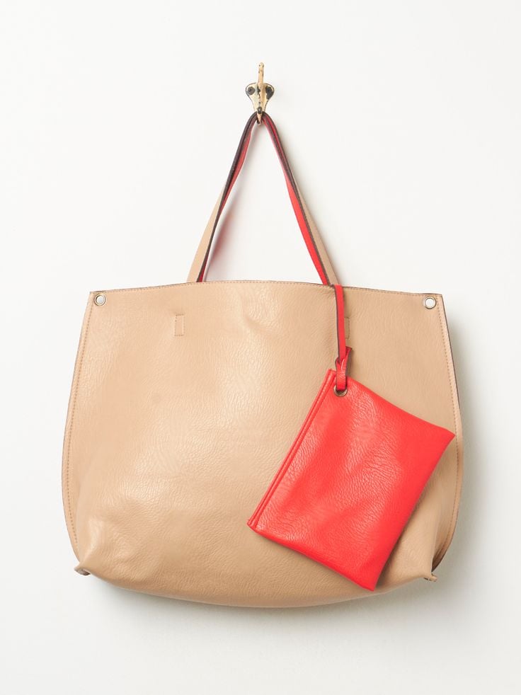 Not only is this slouchy vegan tote ($68) one of the prettiest bags out there, but it features a large removable zipper pouch to keep her laptop or tablet. Plus, it comes in different colors for every mom's taste!