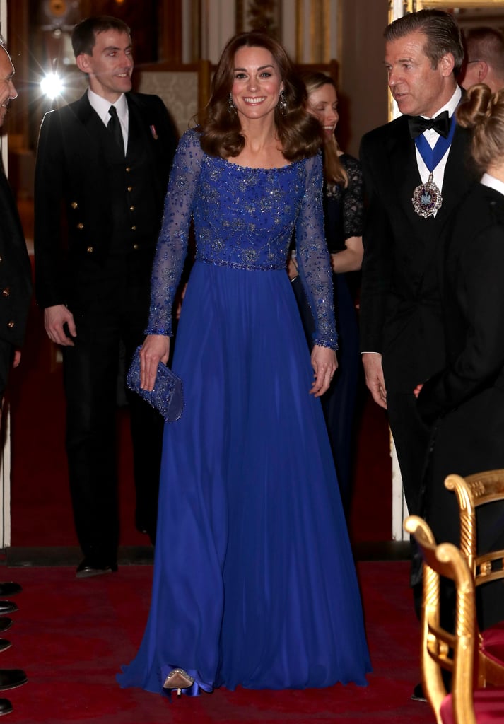 Kate Middleton continues to make sustainable style choices for her royal events. Shortly after the Duchess of Cambridge attended the Commonwealth Day service with Prince William and her in-laws Prince Harry and Meghan Markle, she hosted a gala at Buckingham Palace. Kate met with schoolchildren for the Place2be's 25th anniversary, and she rewore a favorite Jenny Packham gown for the occasion. 
She first wore the intricately designed dress back in 2016 to attend a Bollywood-style celebration in Mumbai. This follows a pattern of recycling outfits, which Kate has established recently, opting for older outfits over new pieces. We stan an eco-concious royal! She tied the glittery blue look together with a matching beaded clutch and sparkling Jimmy Choo pumps. Ahead, see Kate's look from all angles. 

    Related:

            
            
                                    
                            

            Kate Middleton&apos;s English Rose Fascinator Is a Very Significant Fashion Choice
